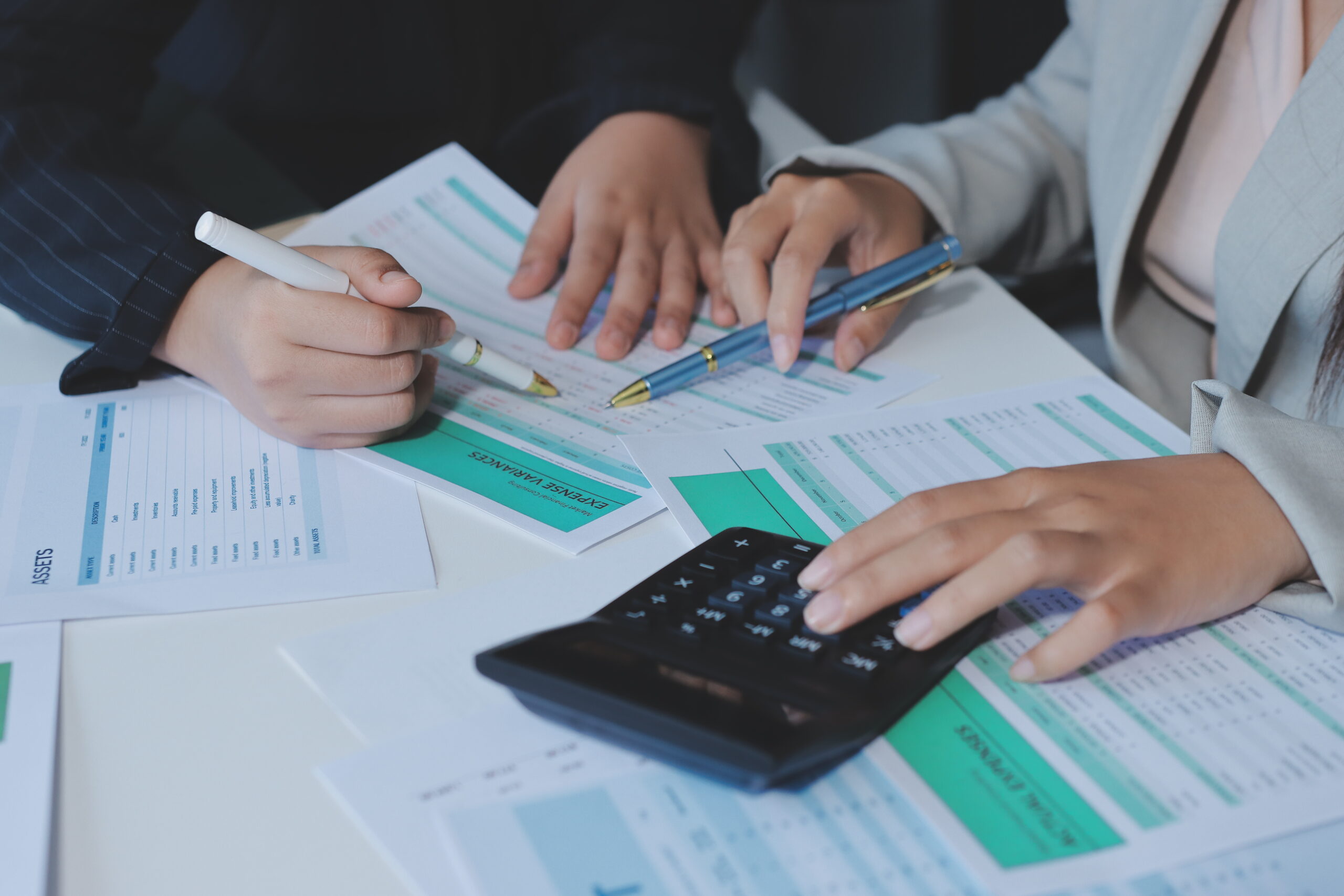 Team of business people are meeting to analyze data for marketin