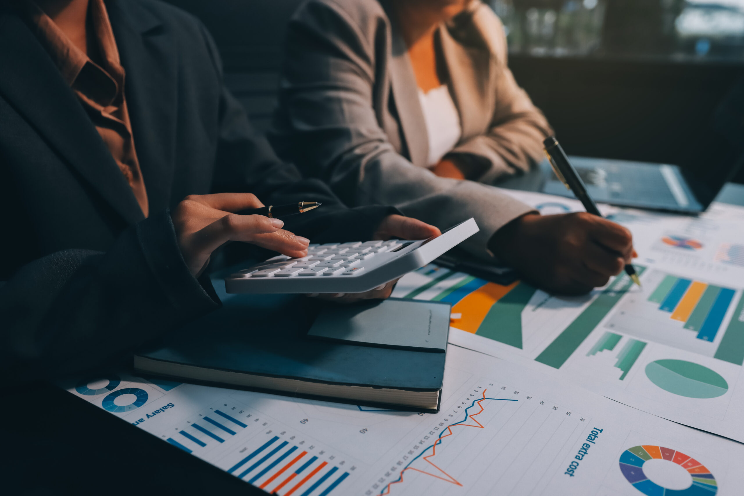 Team of business people are meeting to analyze data for marketin