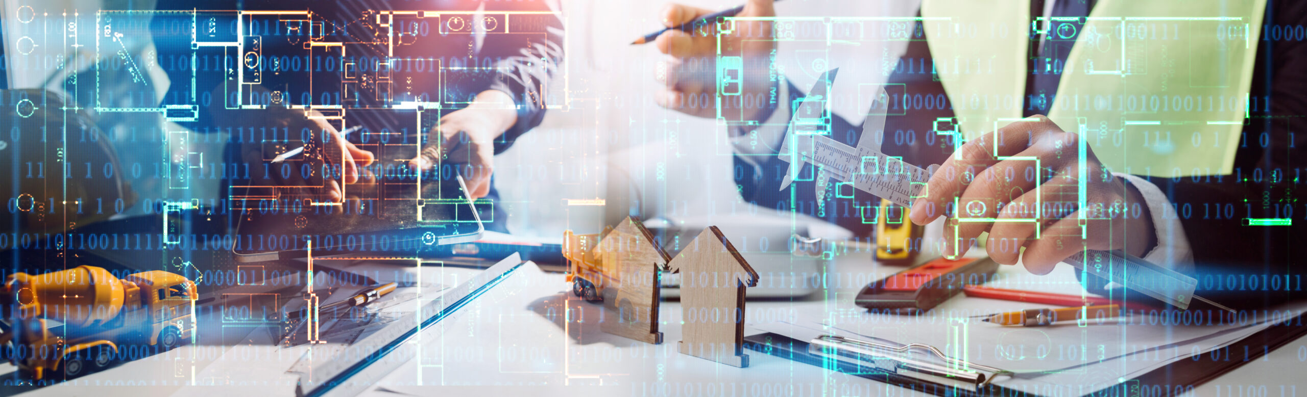 Two colleagues discussing data working and tablet, laptop with o