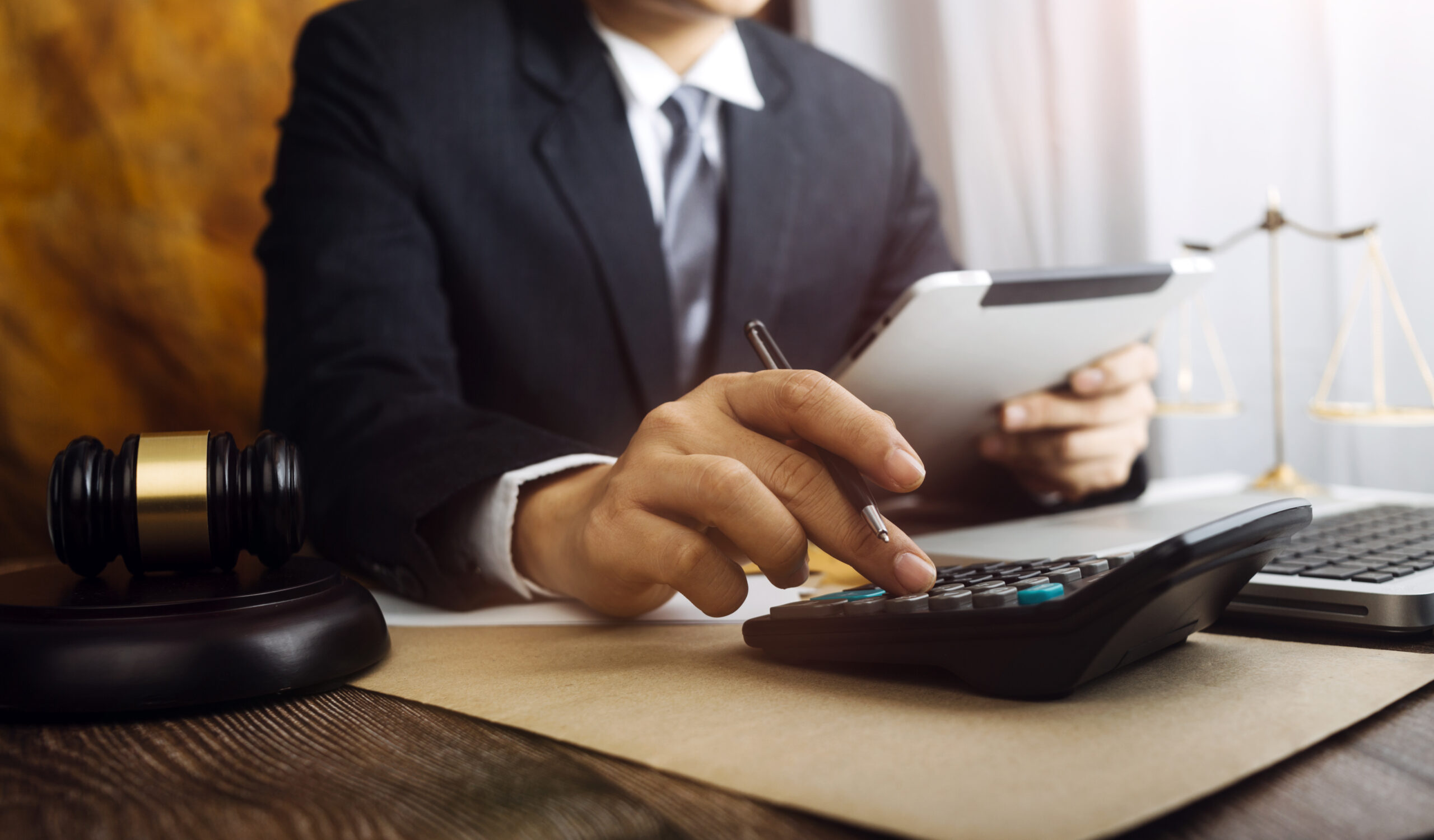 Justice and law concept.Male judge in a courtroom with the gavel